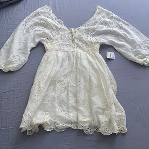 Free People ivory embroidered mini dress.